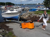 HD Trailer Mover towing boat trailer up slipway in Sweden