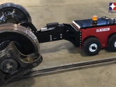 MUV 4WD radio-controlled Electric Tug with grab attachment pulling a wheel set in a rail dept