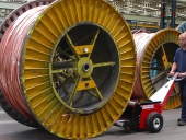 Power Pusher, cable drum pusher, pushing 9,000Kg cable drum at Prysmian Cables.