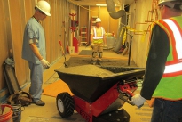 Delivering concrete to internal small works using MUV electric wheelbarrow