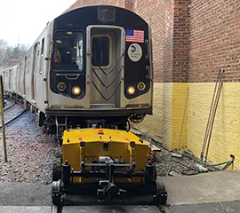 Railcar Mover moving a NYC Subway Carriage