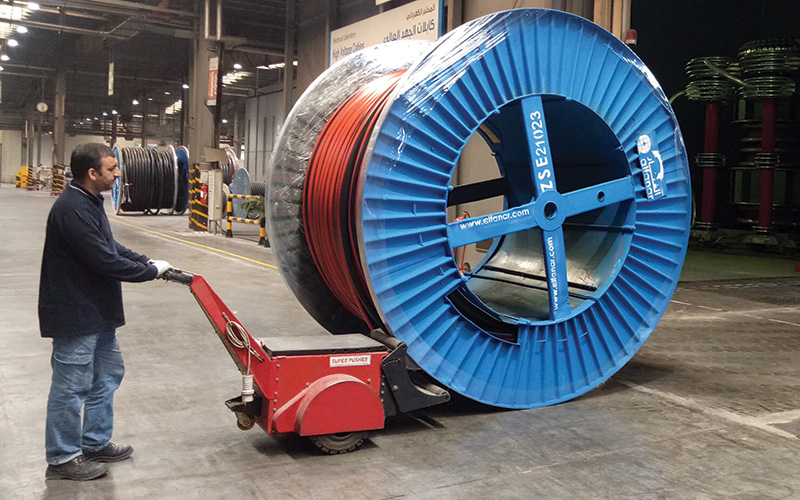 Super Power Pusher pushing Steel Flanged Cable Drum